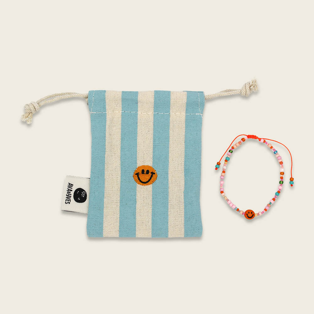 Perlenarmband orange/rosa smile mit Makrameeverschluss und Säckchen