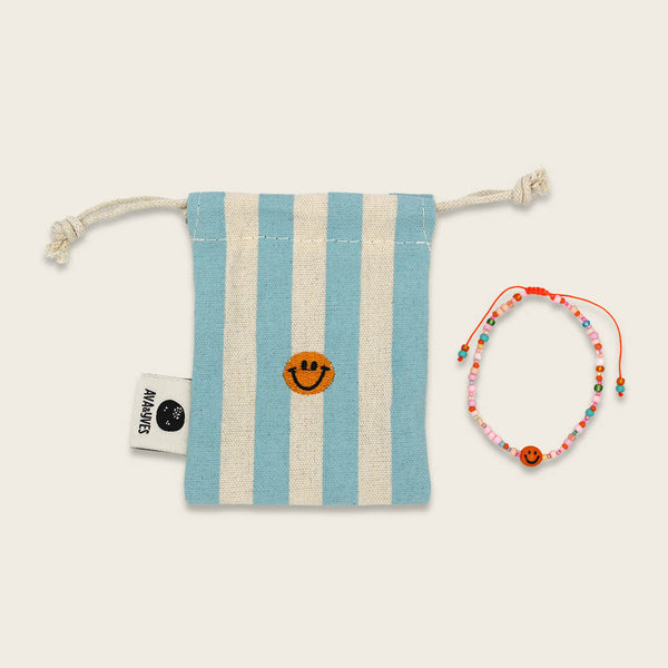 Perlenarmband orange/rosa smile mit Makrameeverschluss und Säckchen