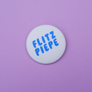 Button "Flitzpiepe" blau