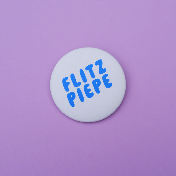 Button "Flitzpiepe" blau