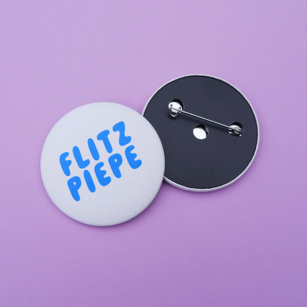 Button "Flitzpiepe" blau