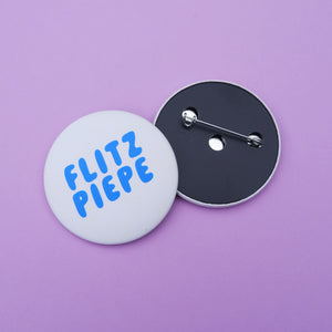 Button "Flitzpiepe" blau