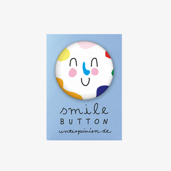 Button "Smile nice" | Unter Pinien